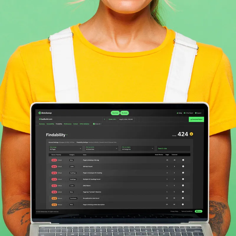 A woman holding a laptop showing an Findability report in BetaSweep